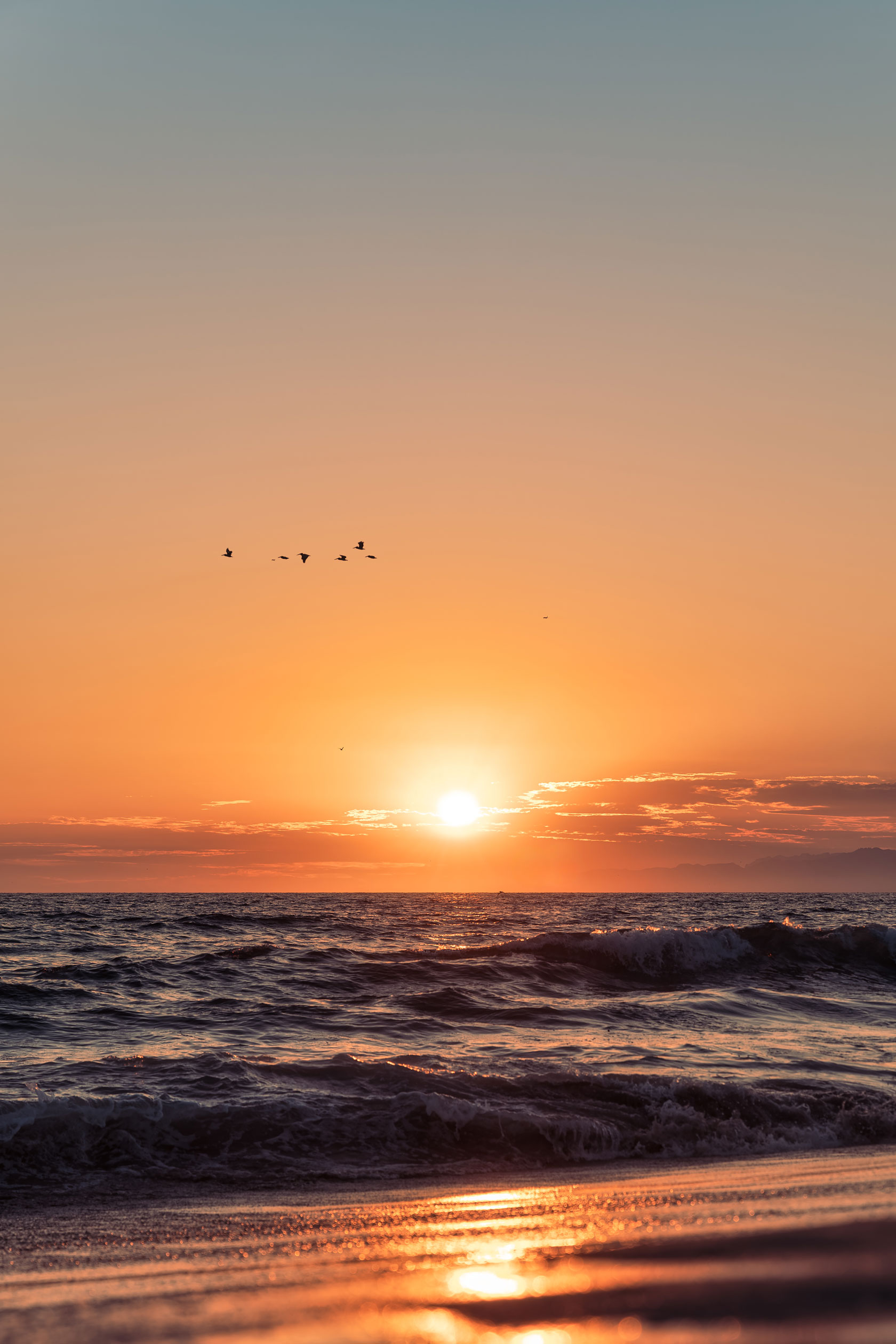 Coucher de soleil sur les vagues californiennes